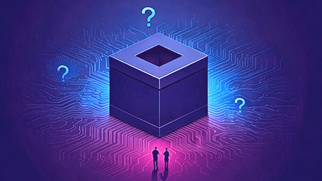 Black-box-with-two-people-looking-at-it