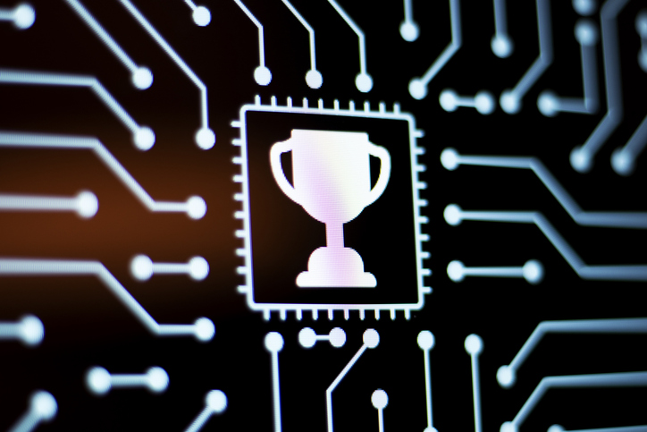A computer chip with a trophy engraved on it.
